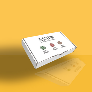 Een proefdoos van risotto bitterballen